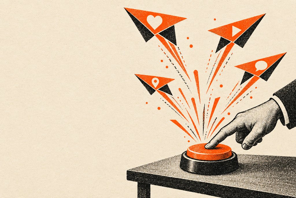 A hand pressing a big orange button that launches paper airplanes